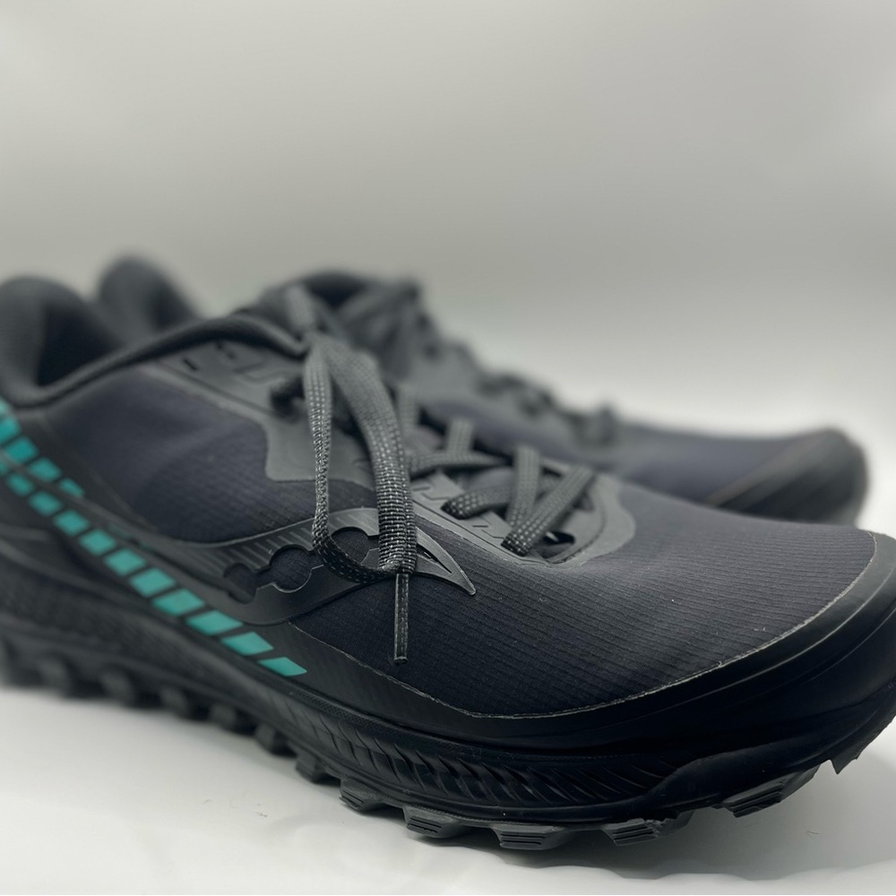 Saucony Black Athletic Shoes with Teal Accents